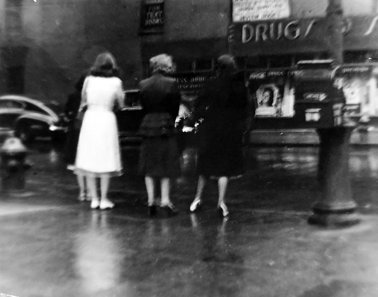 Rainy Day. Three Women at Third Ave. and 23rd St. (Drugs, Soda)