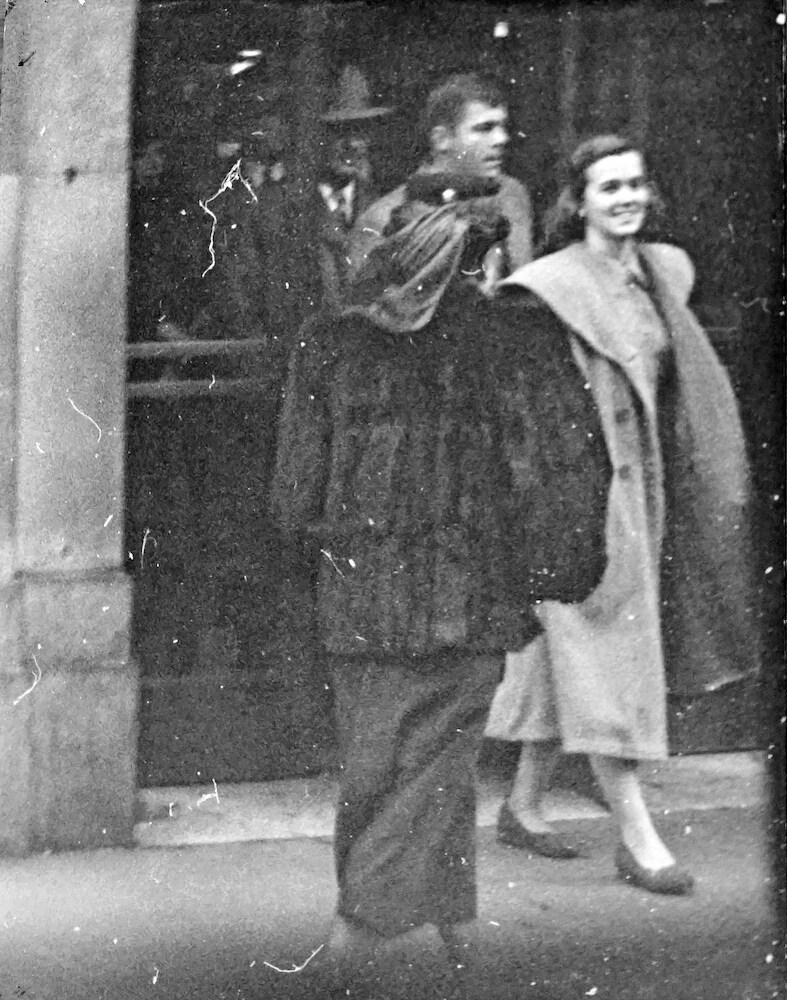 Street Szene. Woman in a Fur Coat in front of a smiling young Woman