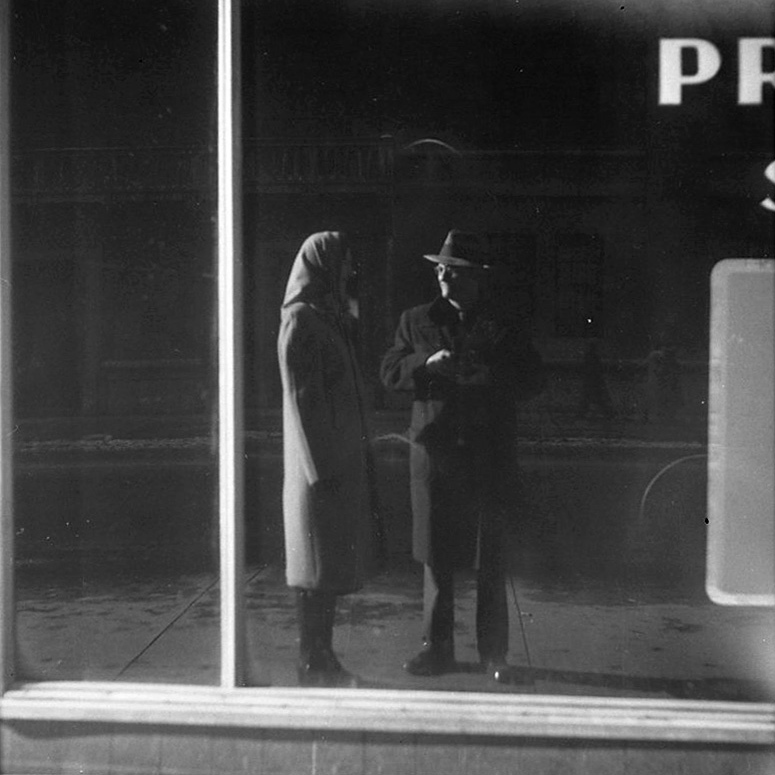 Self-Portrait with a Woman, mirrored in a Shop Window