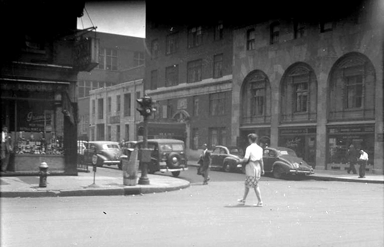 Woman crossing the Intersection