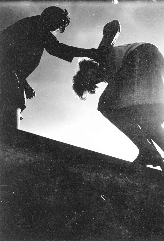 Two Girls climbing up to the Top of the Bauhaus Roof