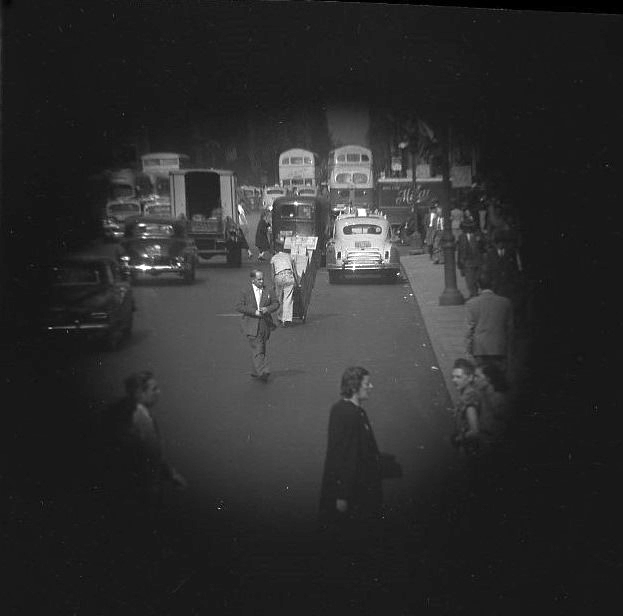 Fifth Avenue. From upper deck of Bus, Man with Dolly [Telescope view]