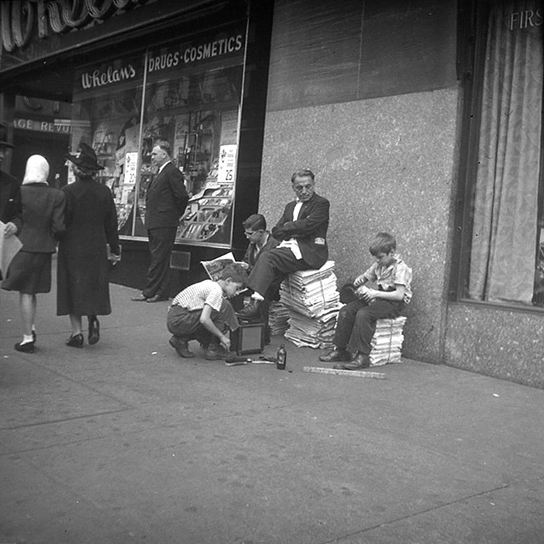 Street Scene. Shoe Shine Stand in Front of Whelan's