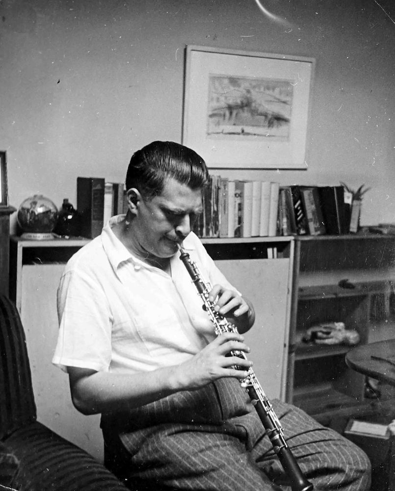Josef Marx playing his Oboe in his Loft