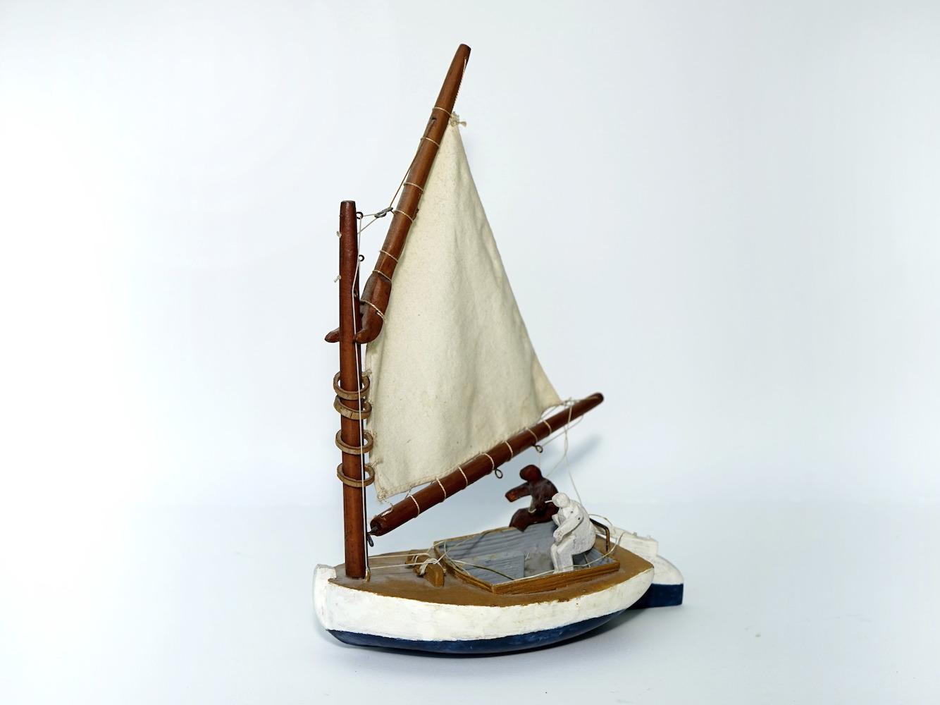 Cat Boat with two Sailors