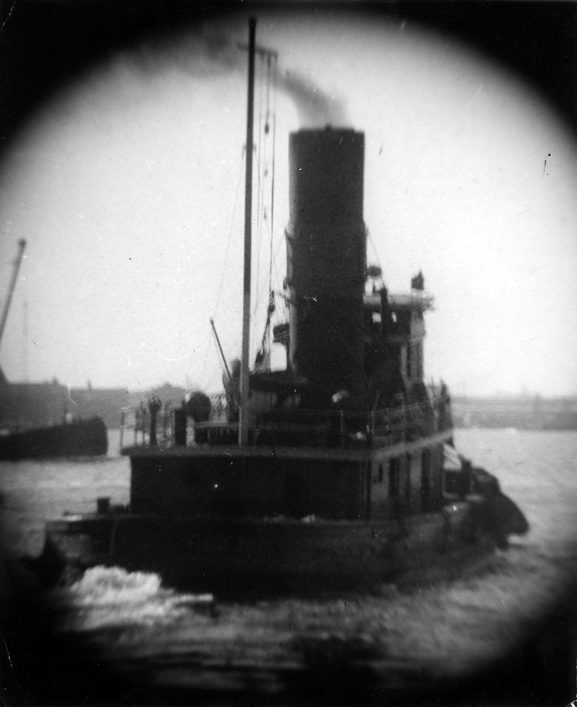 Tugboat, Sternview [Telescope view]