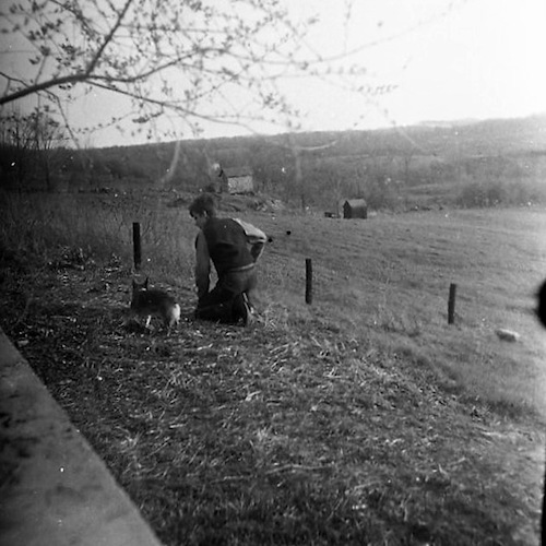 Man with Dog at the Roadside