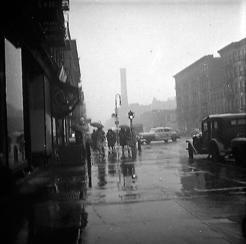 Rainy Day. Pedestrians at a Crossing