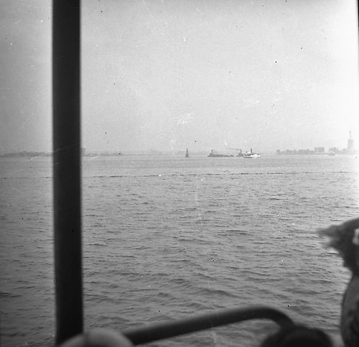 View from New York Central R.R. Ferry. Statue of Liberty at right