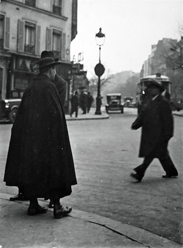 Street Scene in Paris. Pedestrians at the Curb