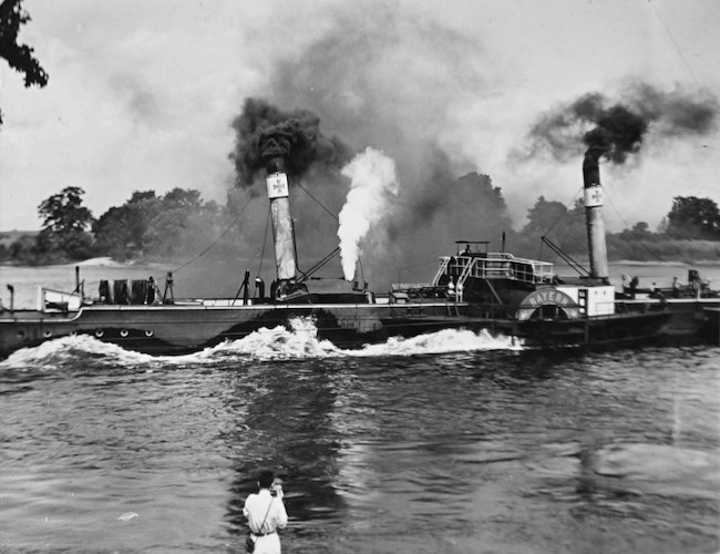 Tug on the Elbe near Dessau, in the foreground Andreas Feininger is making photos