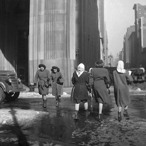 Thawing. Pedestians crossing the Street