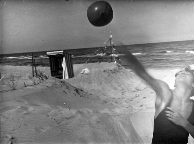 Julia playing with a Ball on the Beach